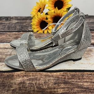 Girls silver sandals by Basic Edition are NWT. Size 1